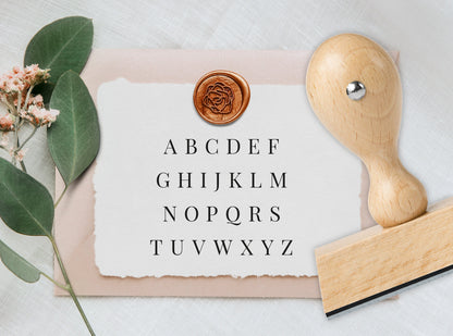 Stempel mit Initialen und Name